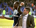 Lee Johnson shows his delight at the end of the game. 