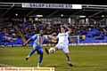 ATHLETIC defender Cliff Byrne tries to get in a block. 
