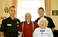 OUR HEROES: Joe and Florence with firefighters Graham Cooper and David Harrison, who spoted the leak 
