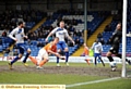 STOOPING TO CONQUER . . . Smith relegates Bury at Gigg Lane 