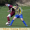 CLOSE CONTACT . . . Hulmeians' Jordan Schofield (purple shirt) shields the ball from Littleborough's Ryan Healy. 



CLOSE CONTACT . . . Hulmeians' Jordan Schofield (purple shirt) shields the ball from Littleborough's Ryan Healy. 