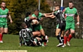 surrounded: Waterhead’s Frazer Coley has nowhere to go as he attempts to burst through the Milford Marlins line. 