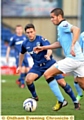 Athletic boss Lee Johnson played for Athletic reserves in their 4-0 Manchester Senior Cup defeat at the hands of Manchester City at Boundary Park. Here he is tracking hat-trick scorer Jack Rodwell. 
