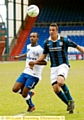 GOING FOR IT: Oldham’s Nathan Eastmond (left) makes a challenge. 