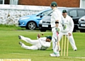 NOT THIS TIME . . . Moorside slip fielder Dave Walters fumbles a catch in Saturday’s LCB Cup romp against Ramsey. 