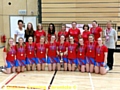 PROUD . . . Oldham’s unbeaten team show off their trophy after national under-16s championship success at Northumbria University. 