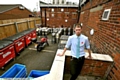 OUTDOOR plans... Shay Wake deputy manager Simon Briggs in the yard the pub wants to turn into a beer garden 
