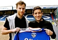 GLAD TO HAVE YOU ON BOARD: James Dayton (left) is welcomed to Boundary Park by Athletic boss Lee Johnson. 
