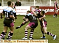 OVER THE TOP: Oldham RL forward Aaron Hall takes the tackle during the Under-20s’ 36-24 home loss to York. 
