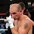 Craig watson: bout off due to shoulder injury 
