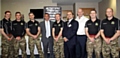 A fine company . . . from left, instructors Becki Turner, Wayne Barker, Jason Magee, financial director Bill Moore, Mike Hamilton, David Fugurally from the Department for Education, Terry Flanagan, instructors Dave Aston and Steve Hodson 
