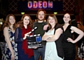 AND action... Royton-born director Adam Lee Hamilton (centre) with students at the red-carpet screening in Manchester 