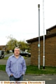 ANGRY . . . Wes Marchant outside his home where there are now three lamp posts 