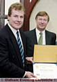 HERO MANAGERS: 1990 and special guest Alex Ferguson presents the Paul Harris Fellowship Award to then-Athletic boss Joe Royle. The Chadderton and Failsworth Rotary Club’s top prize was presented to Royle to mark his services to the community. 