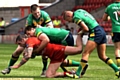 OLDHAM trio Adam Files (left), Phil Joy and Kenny Hughes make sure Stuart Reardon goes to ground at the Racecourse. 
