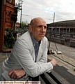 Artist Brian Clarke looks at the changing face of Oldham as he views tramlines in the process of being installed in Union Street 
