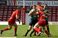 PHIL Joy attempts to break through a Crusaders tackle. 