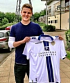 Matt Smith signs for Leeds. Picture courtesy Leeds United 