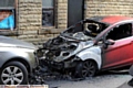 ONE of the cars destroyed in the attacks 
