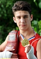 BOXING CLEVER . . . Danny Wright shows off his medal for winning both of his bouts on his England debut. 