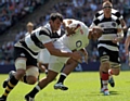 INTERNATIONAL CLASS . . . Kyle Eastmond scores a try during an England friendly against the Barbarians at Twickenham in May. 