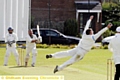 WHAT A CATCH . . . Heyside batsman Tony Heaton can hardly believe it as he is caught and bowled by Greenfeld’s Alex Peters. 
