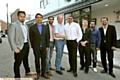 Coliseum artistic director Kevin Shaw (4th left) welcomes Tariq Amin and his group 