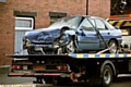The fatal-crash car is taken away by police 