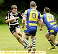 SIDE STEP: Saddleworth Rangers forward Jack Connor takes on the Oulton defence. 