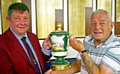 HANDOVER: Stamford captain Dave Allen presents the Centenary Vase to Alan Hartle 