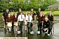 ON the ball: coach Pete Wild (front, right) visits St Joseph’s School with some of his team 

