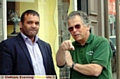 Deputy council leader Shoab Akhtar met store owner Alan Hopkinson last July to discuss the Metrolink traffic issues 
