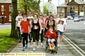 BLISTERS won’t beat us . . . Emily Hester, Anita Claxton, Jenna Goddard and Adam McQuillan lead the walk from Manchester Children’s Hospital to Uppermill 
