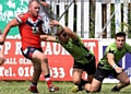 up and running: two-try centre Josh Crowley leaves two South Wales Scorpions players in his wake. 