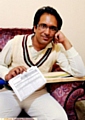 STAYING PUT . . . Friarmere skipper Rizwan Khan with the flight details to Pakistan. 