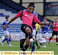 FOCUSED . . . Cristiano Montano looks to bring the ball under control with a Macclesfield player behind him. 
