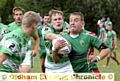 Waterhead’s Kieran Grennan attempts to make a break. 
