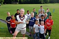 Gordon Whitehead with some of his young Glodwick players 
