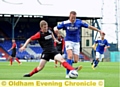WANTED MAN . . . Adam Rooney, pictured winning the penalty which produced Athletic’s first goal, is hopeful of signing for the club before Saturday’s big kick-off. 