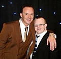 Scott Needham with his singing hero, Russell Watson 
