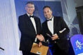 John Ogilvie presenting trophy to Michael Griffiths. 