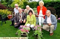 Parish council chairman Councillor Graham Sheldon and other judges in the garden of Thomas Adamson, who won third prize for the Medium Garden Category 