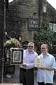 Pub awards. The Swan in Dobcross. Landlords Tim Newbold and Michael Powis