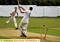 SWING AND A MISS: Heyside batsman Nick Campbell sees his stumps smashed by Greenfield bowler James Ashton. 