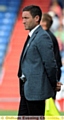 FOOD FOR THOUGHT . . . Athletic boss Lee Johnson looks on. 