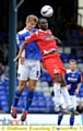 James Tarkowski joins Craig Westcarr in aerial combat. 