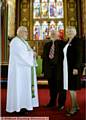 Arnold and Liz Andrew renew their wedding vows with the Rev Derek Palmer at Oldham Parish Church 
