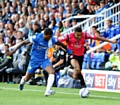 LATICS FLYER: Cristian Montano hugs the touchline at London Road: ‘You protect what you think is right. I may be 5ft 6in, but when I am like that I feel 7ft 6in’ said manager Johnson. 
