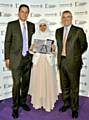 AWARD: Shazia Afzal, business enterprise manager at the Peter Jones Enterprise Academy at Oldham College, with Prince Andrew (right) and “Dragons’ Den” star Peter Jones 