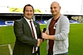 MATCH fit: David Broadbent (left) hands over the microphone to Adam Wilson 

